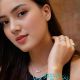 Attractive Malay woman wearing jewelry