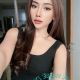 Aimi, a Malay girl, in a black top. Malaysia escort service.
