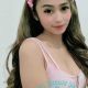 Shazana, KL escort, in pink top and headband.