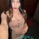 Attractive woman in a beige outfit. Incall and outcall escort services.