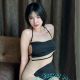 Amilia, a real KL escort girl, poses for a photo.