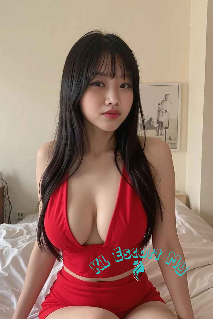 Attractive young woman in red lingerie. KL Escort My.