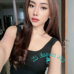 Attractive young woman in black top, KL Escort My