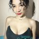 Attractive young woman in a black top. Local escort services.