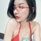 Attractive woman in red bikini top. Local escort services.
