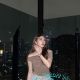 Aimi, a Malay girl, enjoys a city view. Malaysia escort service.