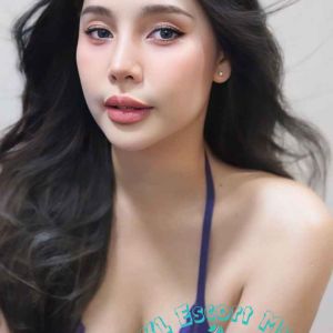 Attractive young woman in a purple lace bra. KL Escort My.