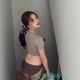 Attractive Malay woman with luggage, offering incall & outcall escort services.