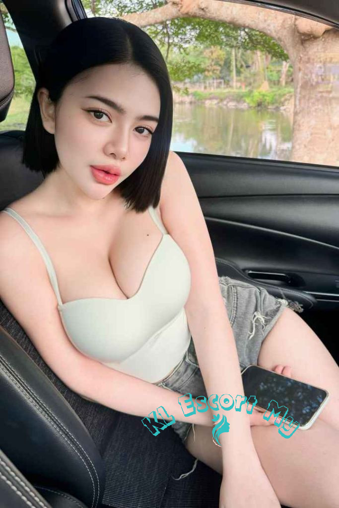 Attractive young woman in a car, KL Escort My