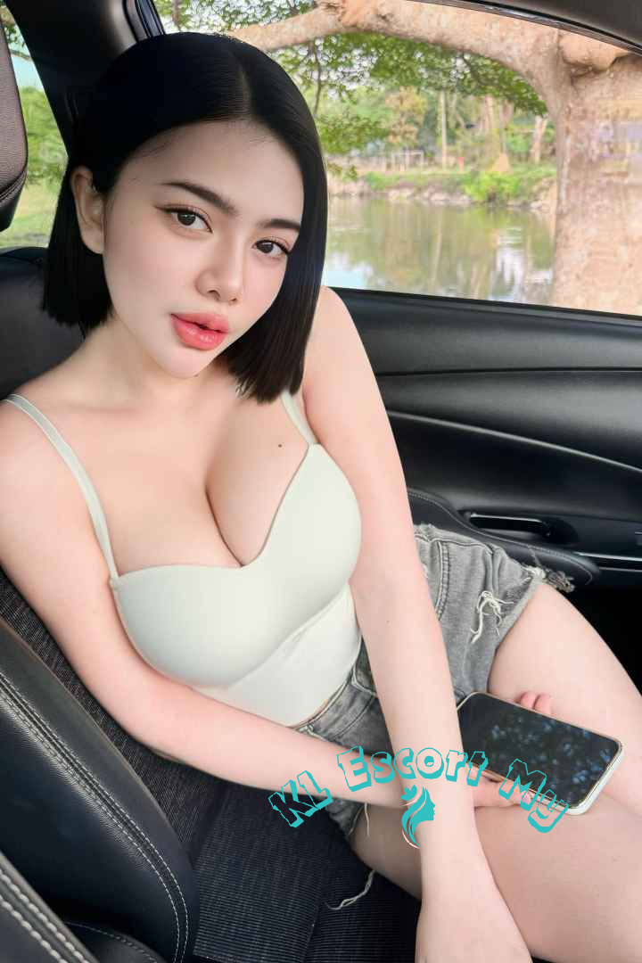 Attractive young woman in a car, KL Escort My