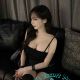 Attractive Korea escort in Kuala Lumpur, wearing a black dress.