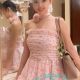 Aiza, a Malaysia escort model, in a pink dress.