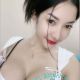 Attractive young woman in white top. Local escort services.