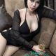 Attractive KL escort agency model in black lingerie.