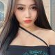 Shazana, KL Escort Outcall. Attractive woman in black top.